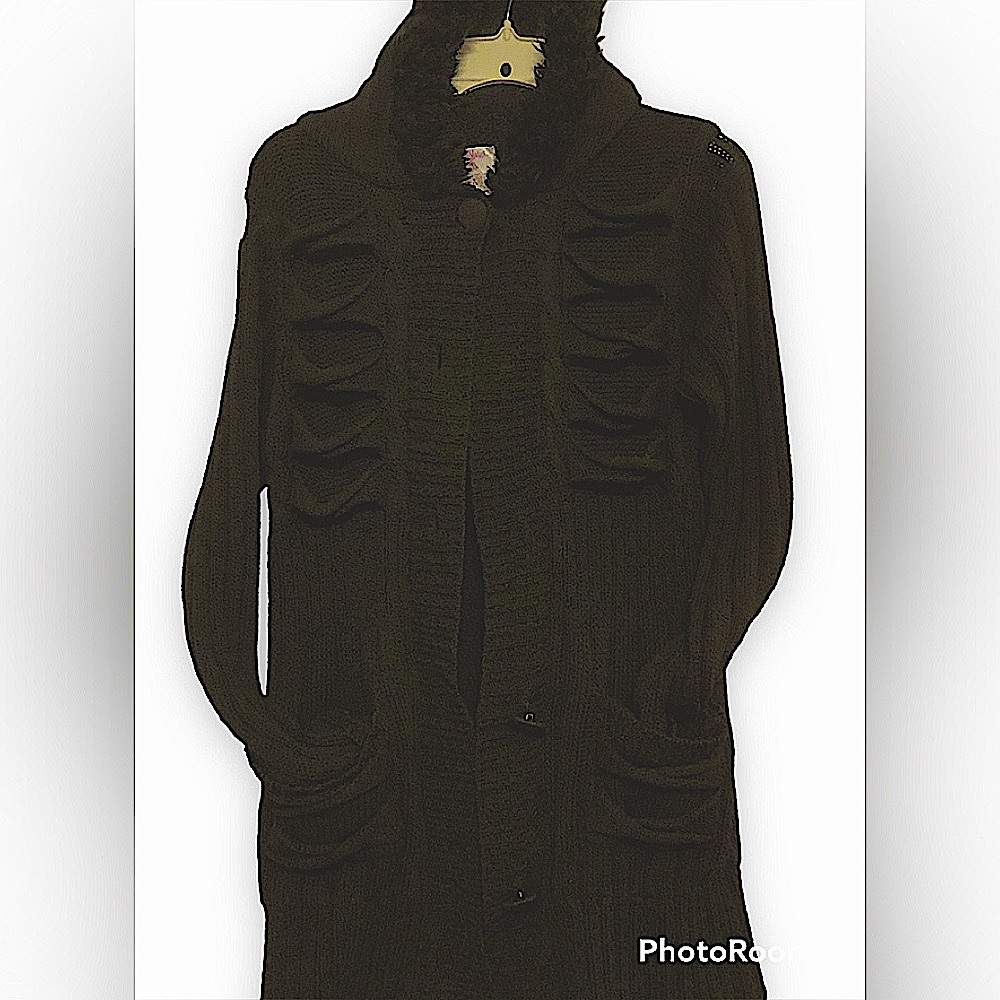 From Hot Topic store is this duster in pre owned condition.
